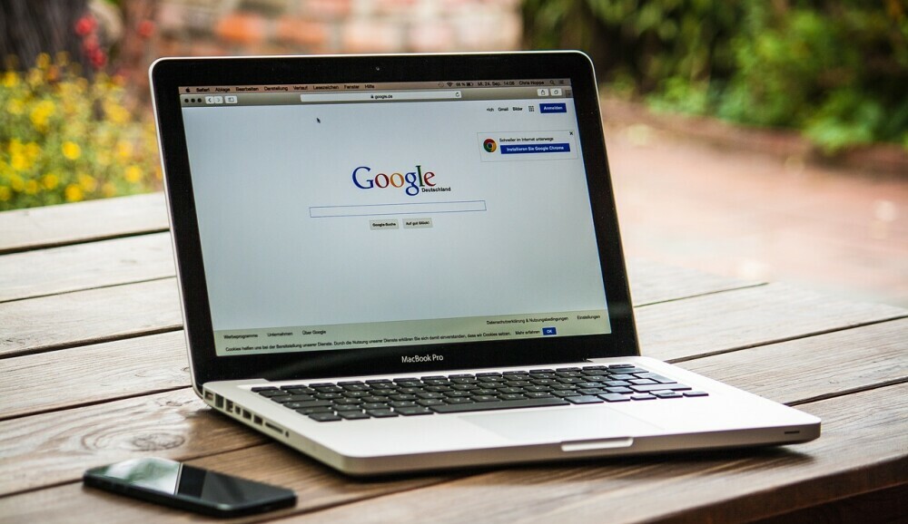 Apple laptop with Google page open